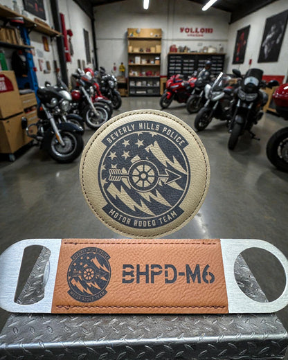 Precision laser etching on a leatherette bottle opener and coaster using a CO2 laser engraver at Central Coast Laser and Engraving in Nipomo.