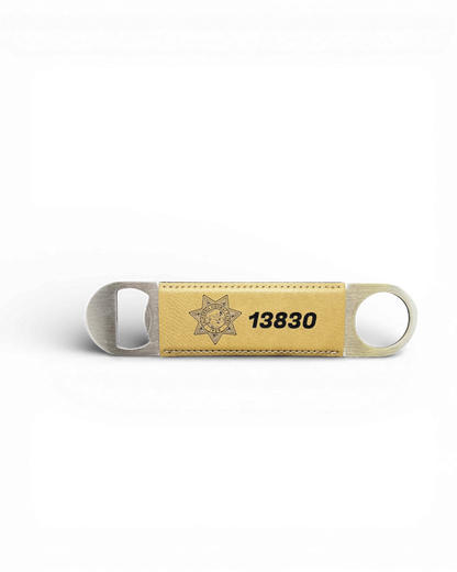 Custom laser engraved bottle opener. Stainless steel, leather wrapped.